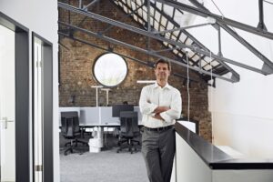 Portrait of mature businessman in modern office
