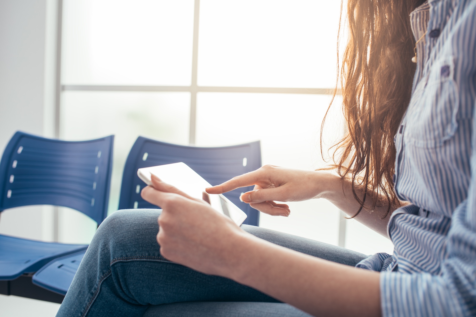 Woman connecting in the waiting room