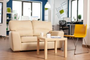 Modern business relax zone interior with confortable couch